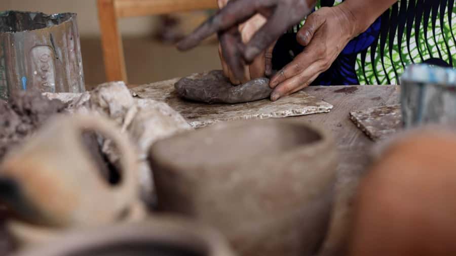 Kigali: Traditional Kubumba Pottery Making with Local Women - Getting your hands into the clay